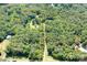 Aerial view of the property, highlighting its vast land surrounded by lush greenery at 6575 Charlotte Hwy, York, SC 29745