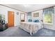 Cozy bedroom with blue accents, a large window, and ample closet space at 6575 Charlotte Hwy, York, SC 29745