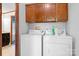 Efficient laundry room with modern appliances and storage cabinets at 6575 Charlotte Hwy, York, SC 29745