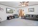 Cozy living room featuring plush seating, a ceiling fan, and ample space for relaxation and entertainment at 6575 Charlotte Hwy, York, SC 29745