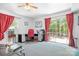Bright office space with a desk, chair, and sliding doors leading to an outdoor patio, perfect for productivity at 6575 Charlotte Hwy, York, SC 29745