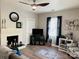 Inviting living room with a fireplace, hardwood floors, and cozy seating area at 806 Grace St, Kings Mountain, NC 28086