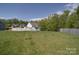 Large backyard with a white fence and plenty of green space, perfect for outdoor activities at 848 Wingthorn Rose Dr, Gastonia, NC 28056