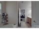 Bathroom featuring a single sink vanity, shelves, and bathtub at 848 Wingthorn Rose Dr, Gastonia, NC 28056