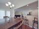 Bright dining area that opens to living area with barstool seating available at 848 Wingthorn Rose Dr, Gastonia, NC 28056