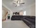 Open-concept living space connects seamlessly to kitchen with convenient staircase access at 848 Wingthorn Rose Dr, Gastonia, NC 28056