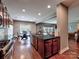 Open concept kitchen with dark granite countertops, stainless steel appliances, and hardwood flooring at 9622 Harvest Pond Nw Dr, Concord, NC 28027