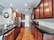 Modern kitchen featuring stainless steel appliances, sleek countertops, and ample cabinet space at 9622 Harvest Pond Nw Dr, Concord, NC 28027