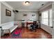 Bright home office with natural light, hardwood floors, and built-in features for productivity at 9622 Harvest Pond Nw Dr, Concord, NC 28027
