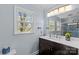 The bathroom has a modern vanity, sleek fixtures, and ample natural light at 9637 Stoney Hill Ln, Charlotte, NC 28277
