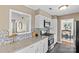 Updated kitchen featuring stainless steel appliances, granite countertops, and tiled backsplash at 9637 Stoney Hill Ln, Charlotte, NC 28277
