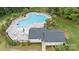 Aerial view of the community pool and clubhouse, with lounge chairs and ample patio space at 1117 Cedar Park Dr, Pineville, NC 28134