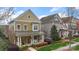 Charming two-story home with a welcoming front porch and manicured front yard at 1117 Cedar Park Dr, Pineville, NC 28134