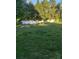 A spacious backyard featuring a lush grassy area at 1204 Borders Rd, Shelby, NC 28150