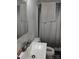 Bright bathroom featuring a white sink, toilet, and shower, accented by neutral tones for a clean, modern aesthetic at 1204 Borders Rd, Shelby, NC 28150