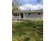 Quaint one-story home with grey brick, a cozy front porch, and lawn at 1204 Borders Rd, Shelby, NC 28150