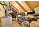 Unfinished attic space used for storage with exposed wooden beams at 14130 Misty Brook Ln, Charlotte, NC 28273