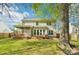 Picture of the large backyard with a screened in porch and lots of green space at 14130 Misty Brook Ln, Charlotte, NC 28273