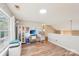 Open bonus room featuring a loft area, a home office space and an abundance of light at 14130 Misty Brook Ln, Charlotte, NC 28273
