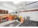 View of garage that is very spacious and includes workshop benches and tool storage at 14130 Misty Brook Ln, Charlotte, NC 28273