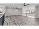 Bright bonus room with wood flooring, lots of natural light and modern ceiling fans at 143 Mills Garden Rd, Statesville, NC 28625
