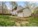 Spacious backyard showcasing a patio and well-kept yard at 1555 Ridgewood Dr, Gastonia, NC 28054