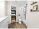 This white marble bathroom features a walk-in shower and is attached to the main bedroom at 1555 Ridgewood Dr, Gastonia, NC 28054
