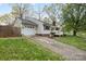 Charming home featuring a well-manicured lawn, attached garage, and inviting front porch at 1555 Ridgewood Dr, Gastonia, NC 28054