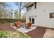 Cozy patio with an outdoor seating area and landscape design at 1555 Ridgewood Dr, Gastonia, NC 28054