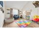 Bright playroom with a ball pit, blue arm chair, and educational toys at 1555 Ridgewood Dr, Gastonia, NC 28054