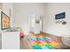 Spacious playroom with educational toys, and access to the main room and bathroom at 1555 Ridgewood Dr, Gastonia, NC 28054
