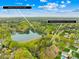Aerial view showcases the property's proximity to a neighborhood boat launch and natural surroundings at 158 Regency Rd, Mooresville, NC 28117