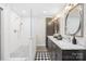 Bright bathroom features a glass shower and double sink vanity with marble countertop at 158 Regency Rd, Mooresville, NC 28117