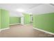 Large bonus room with neutral carpet, sloped ceilings and ample space for activities at 158 Regency Rd, Mooresville, NC 28117