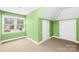 Bonus room featuring neutral carpet and a window with natural light at 158 Regency Rd, Mooresville, NC 28117