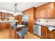Gourmet kitchen with granite countertops, stainless steel appliances, and a functional island at 158 Regency Rd, Mooresville, NC 28117