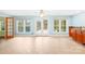 Bright room featuring tile floors and multiple windows providing natural light at 158 Regency Rd, Mooresville, NC 28117