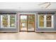 Bright living space with windows overlooking serene waterfront views at 158 Regency Rd, Mooresville, NC 28117