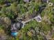 Aerial view of the house with a swimming pool, surrounded by lush greenery at 1725 Hannon Farm Rd, Fort Mill, SC 29715