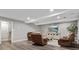 Basement living area with a large TV, comfortable seating, and recessed lighting at 1725 Hannon Farm Rd, Fort Mill, SC 29715