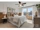 Inviting bedroom with natural light, cozy bedding, and stylish decor at 2014 Puddle Pond Rd, Indian Trail, NC 28079