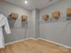 Spacious walk-in closet with shelving, hanging rods and hardwood floors at 2014 Puddle Pond Rd, Indian Trail, NC 28079