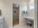 Well-organized walk-in closet with built-in shelving and a vanity at 2014 Puddle Pond Rd, Indian Trail, NC 28079