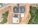 Overhead view of community amenities: clubhouse, pool, tennis courts, and parking at 2252 Tabor Rd # 575, Sherrills Ford, NC 28673