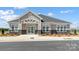 Exterior of the community clubhouse featuring stone accents and a welcoming entrance at 2252 Tabor Rd # 575, Sherrills Ford, NC 28673