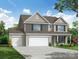 Charming two-story home featuring a three-car garage, neutral siding, and a well-manicured lawn at 2252 Tabor Rd # 575, Sherrills Ford, NC 28673