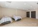 Large bedroom with two beds, light wood floors and plenty of space at 239 Paradise Peninsula Rd, Mooresville, NC 28117