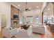 Spacious living room boasts a stone fireplace, high ceilings, hardwood floors and an open layout at 239 Paradise Peninsula Rd, Mooresville, NC 28117