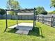 Green backyard featuring patio with shade, fenced perimeter, and lush lawn at 2906 Montford Nw Ave, Concord, NC 28027