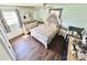 Spacious bedroom showcasing stylish furnishings and hardwood floors at 2906 Montford Nw Ave, Concord, NC 28027